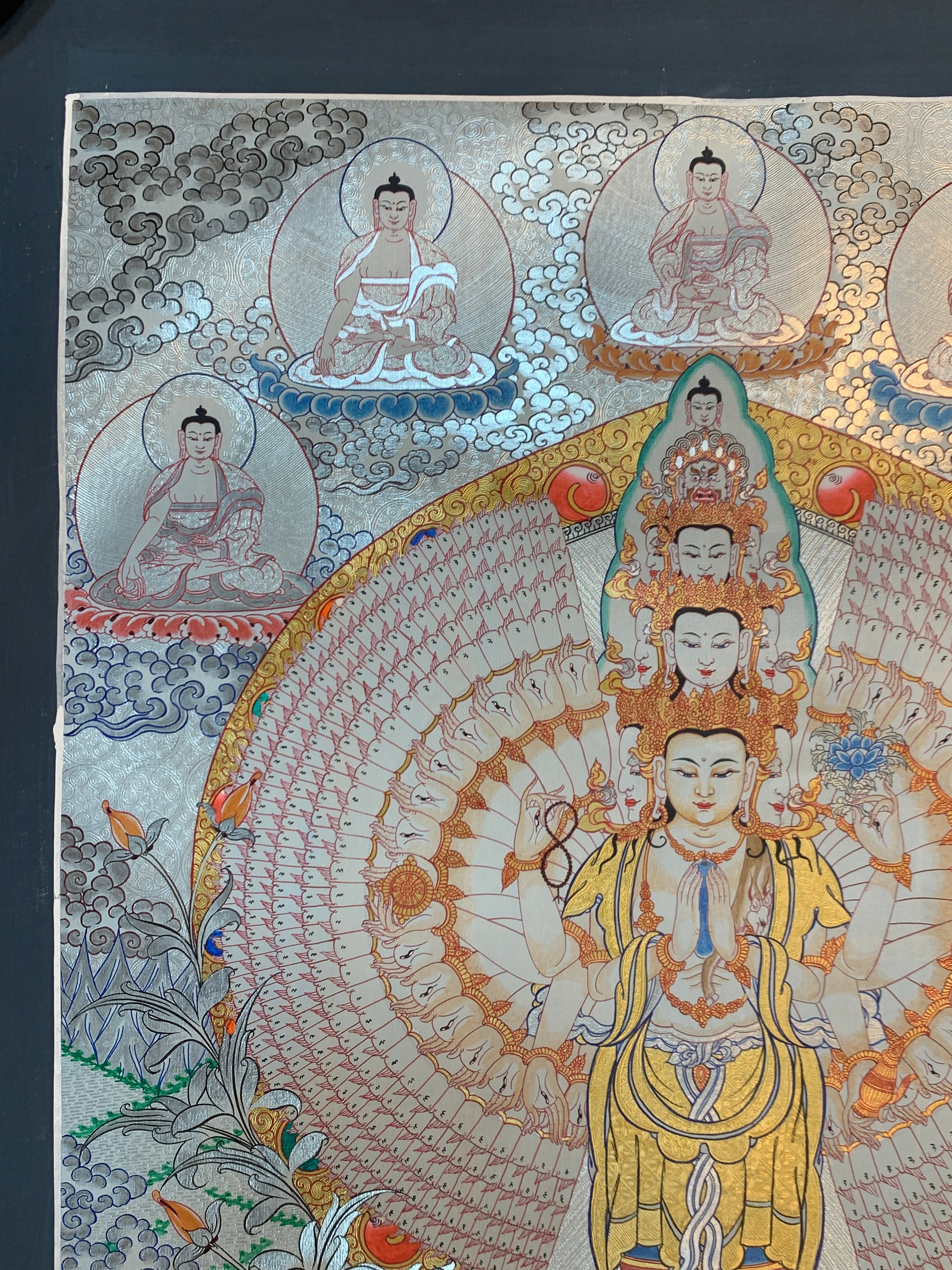 Hand painted SIlver and gold plated thousand armed avalokitesvara thangka painting.