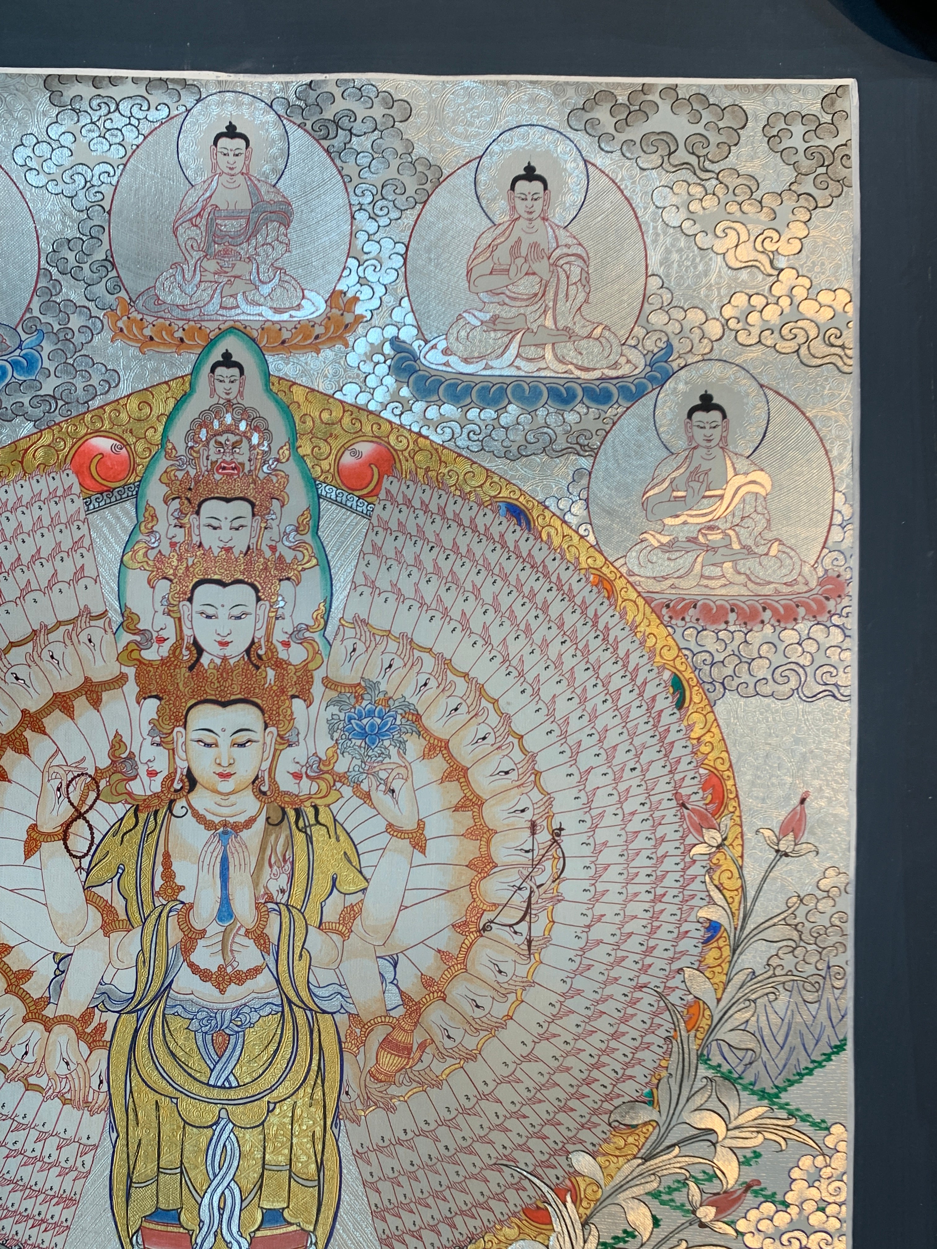 Hand painted SIlver and gold plated thousand armed avalokitesvara thangka painting.
