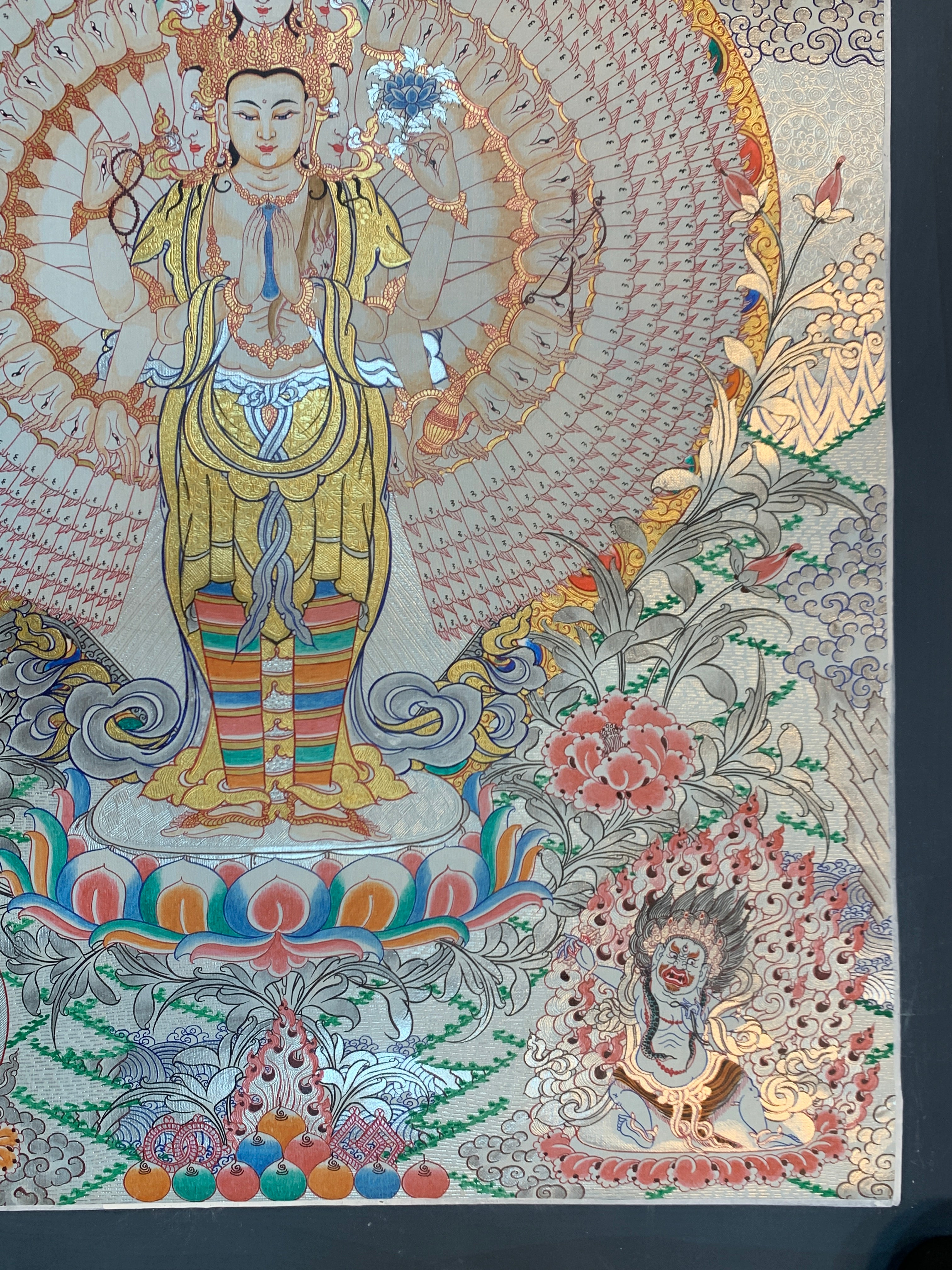 Hand painted SIlver and gold plated thousand armed avalokitesvara thangka painting.
