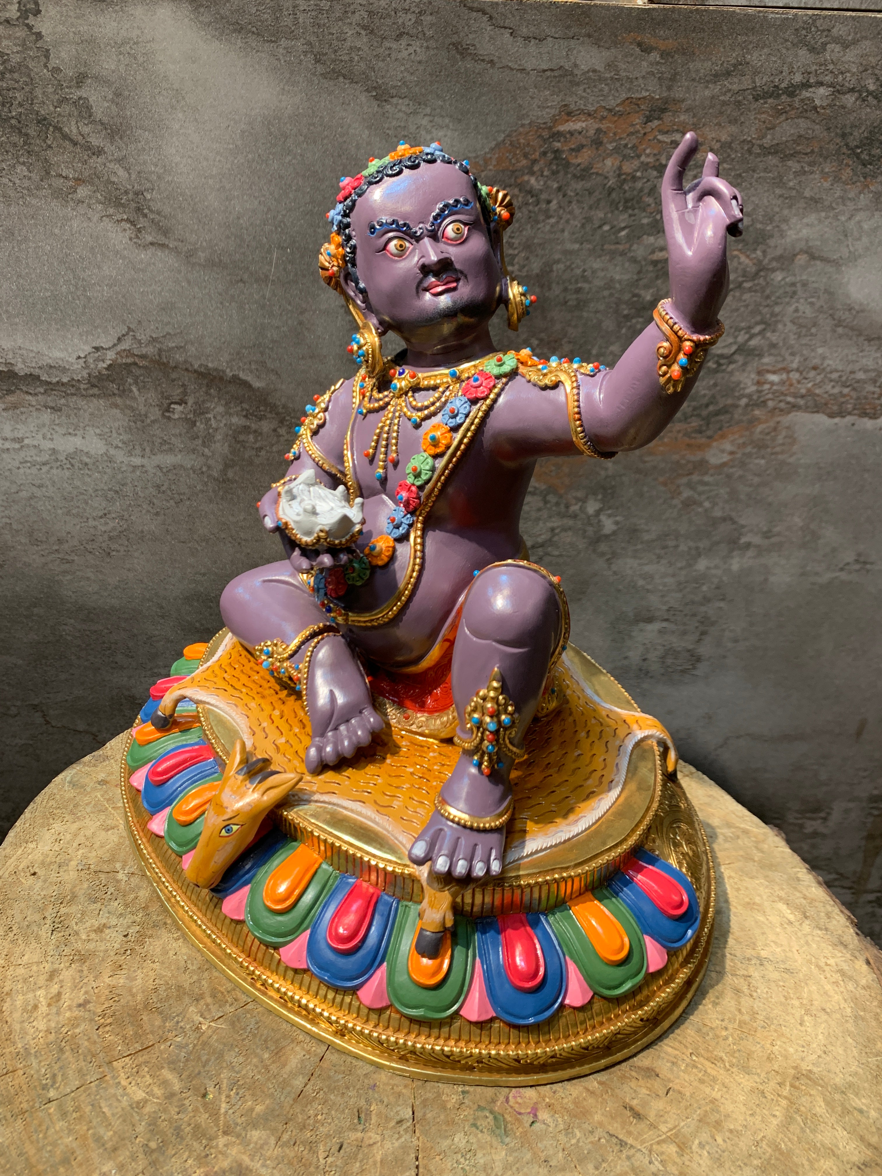 Colorful Virupa statue. hand crafted copper idol of mahasiddha Virupa.