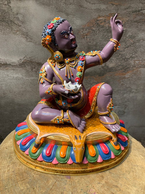 Colorful Virupa statue. hand crafted copper idol of mahasiddha Virupa.