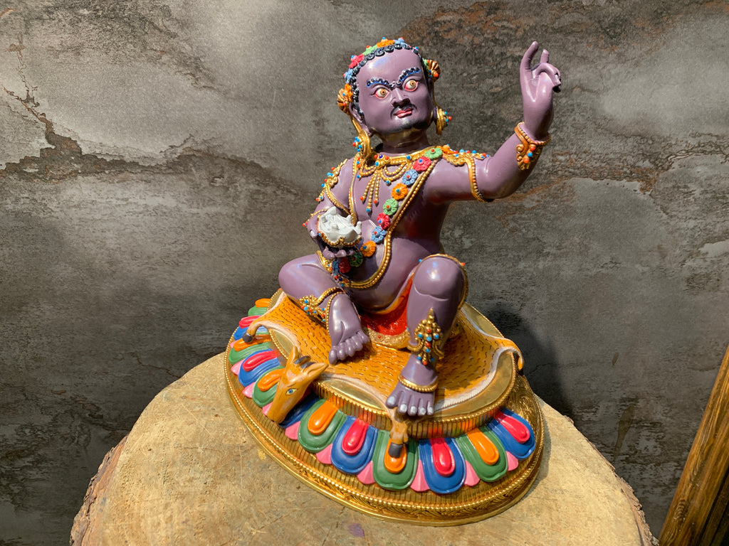 Colorful Virupa statue. hand crafted copper idol of mahasiddha Virupa.