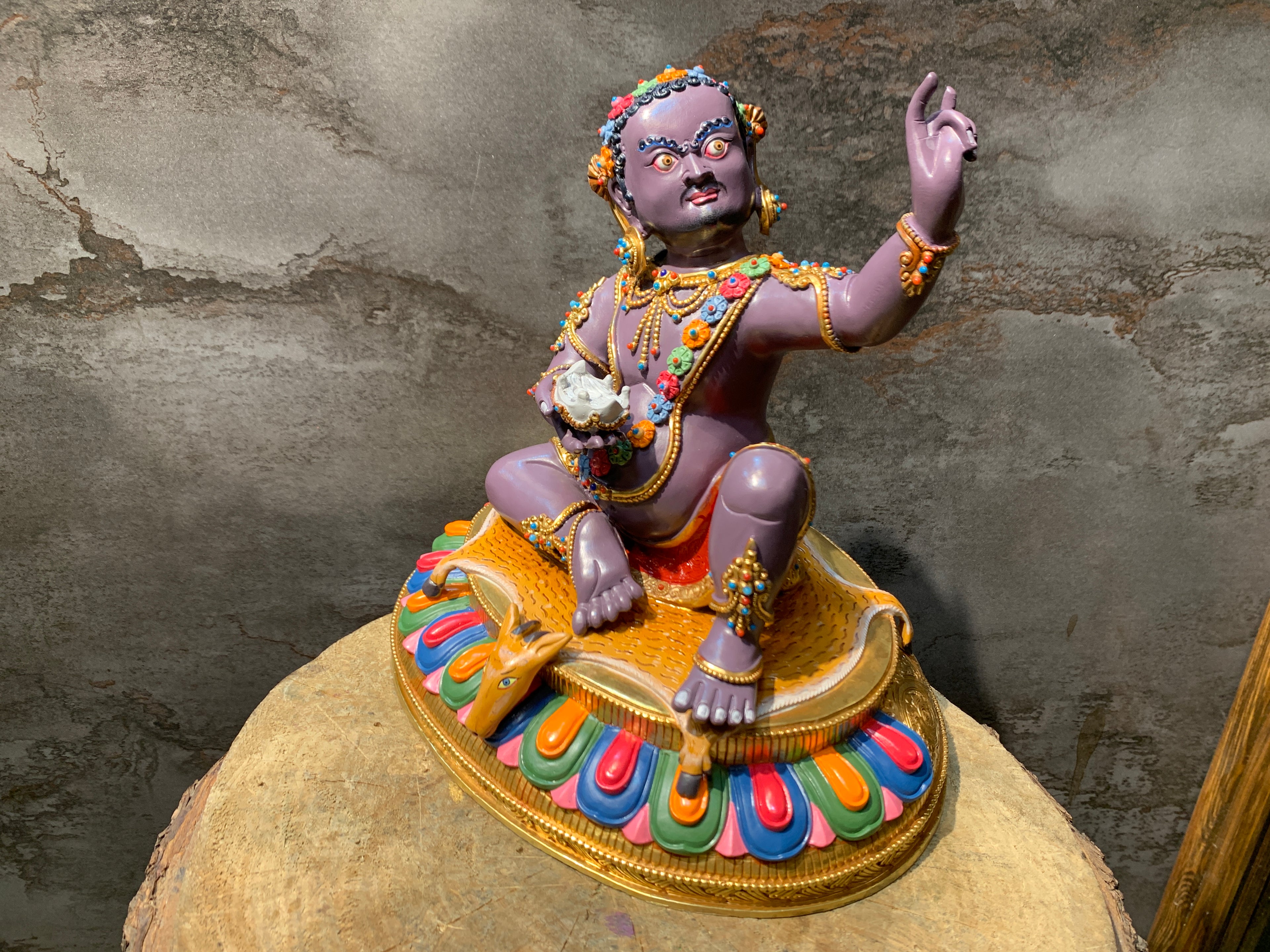 Colorful Virupa statue. hand crafted copper idol of mahasiddha Virupa.