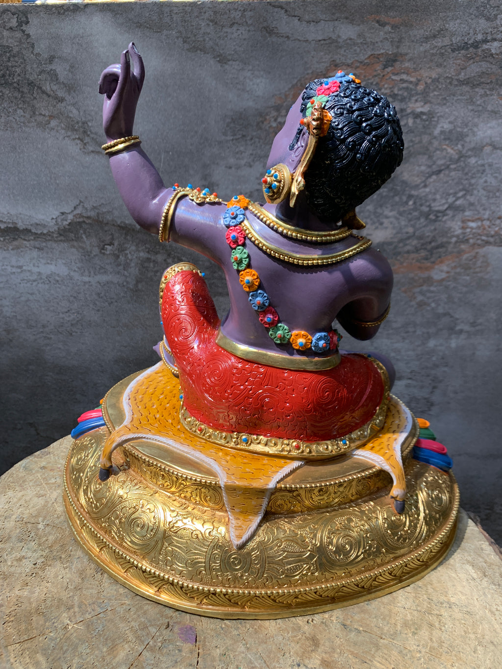Colorful Virupa statue. hand crafted copper idol of mahasiddha Virupa.