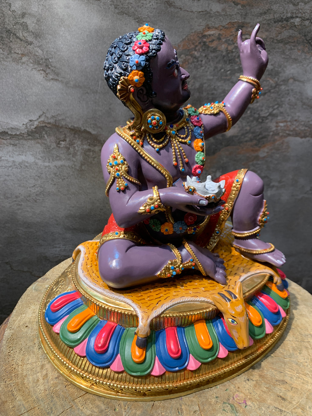 Colorful Virupa statue. hand crafted copper idol of mahasiddha Virupa.