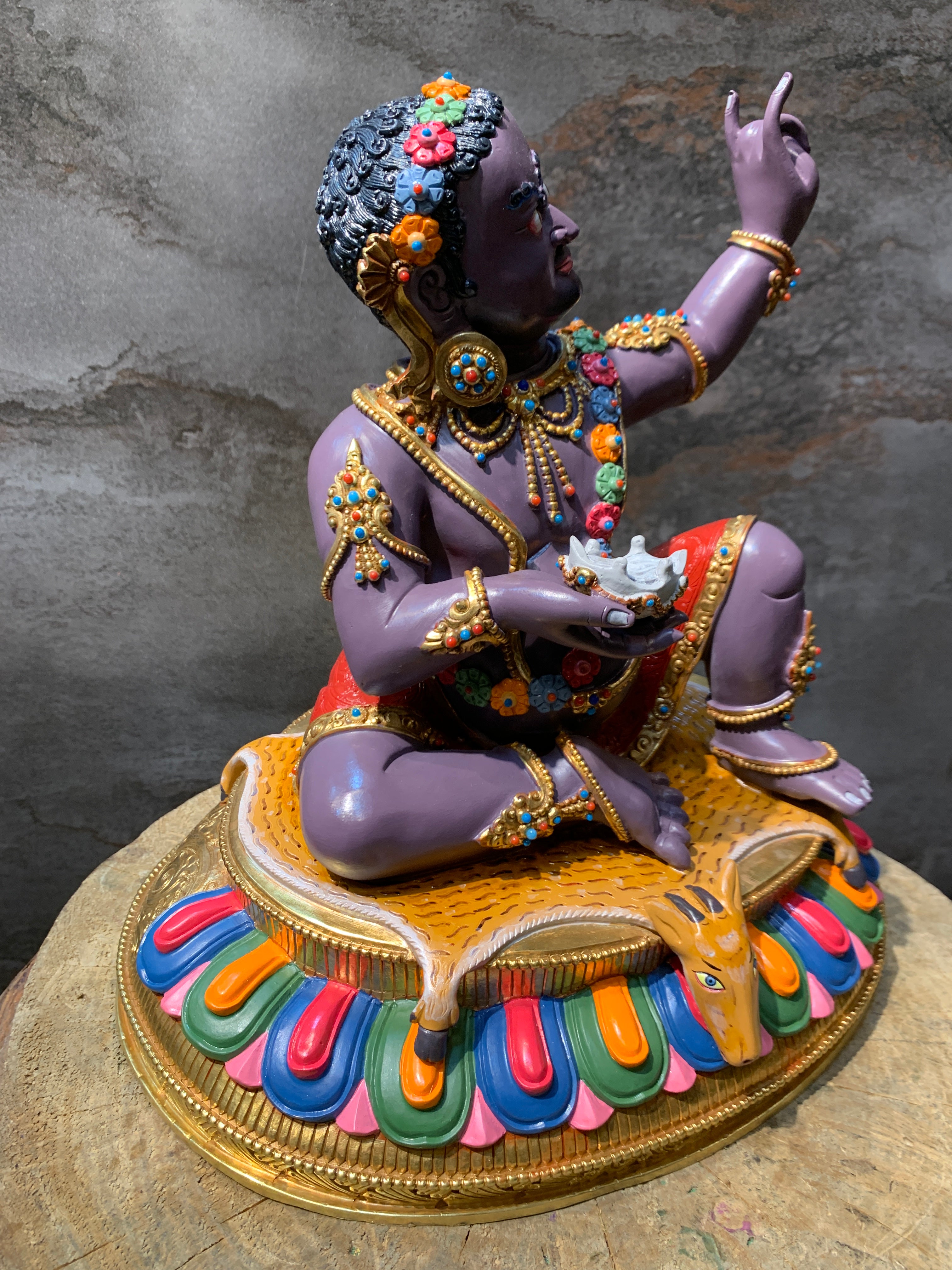 Colorful Virupa statue. hand crafted copper idol of mahasiddha Virupa.