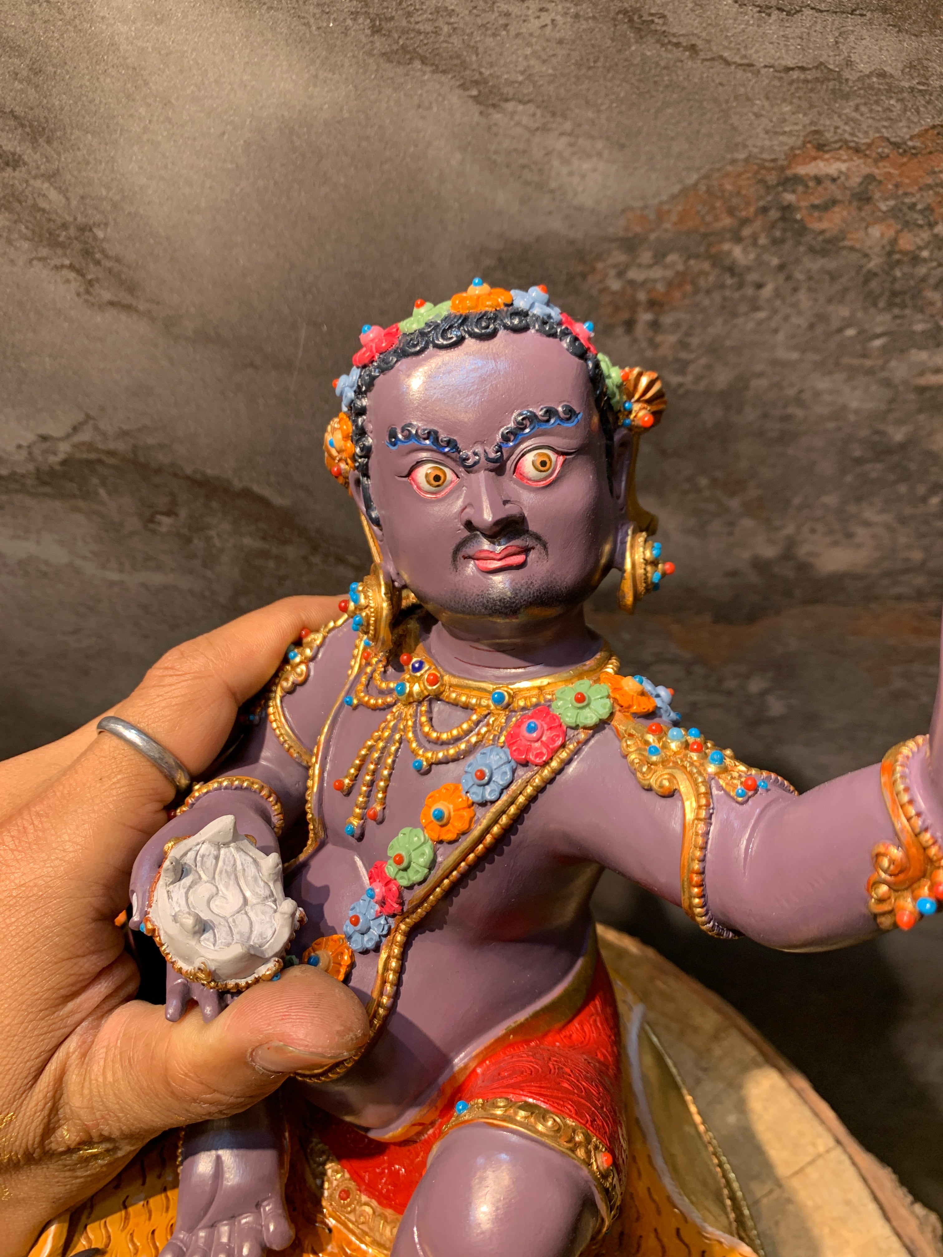 Colorful Virupa statue. hand crafted copper idol of mahasiddha Virupa.