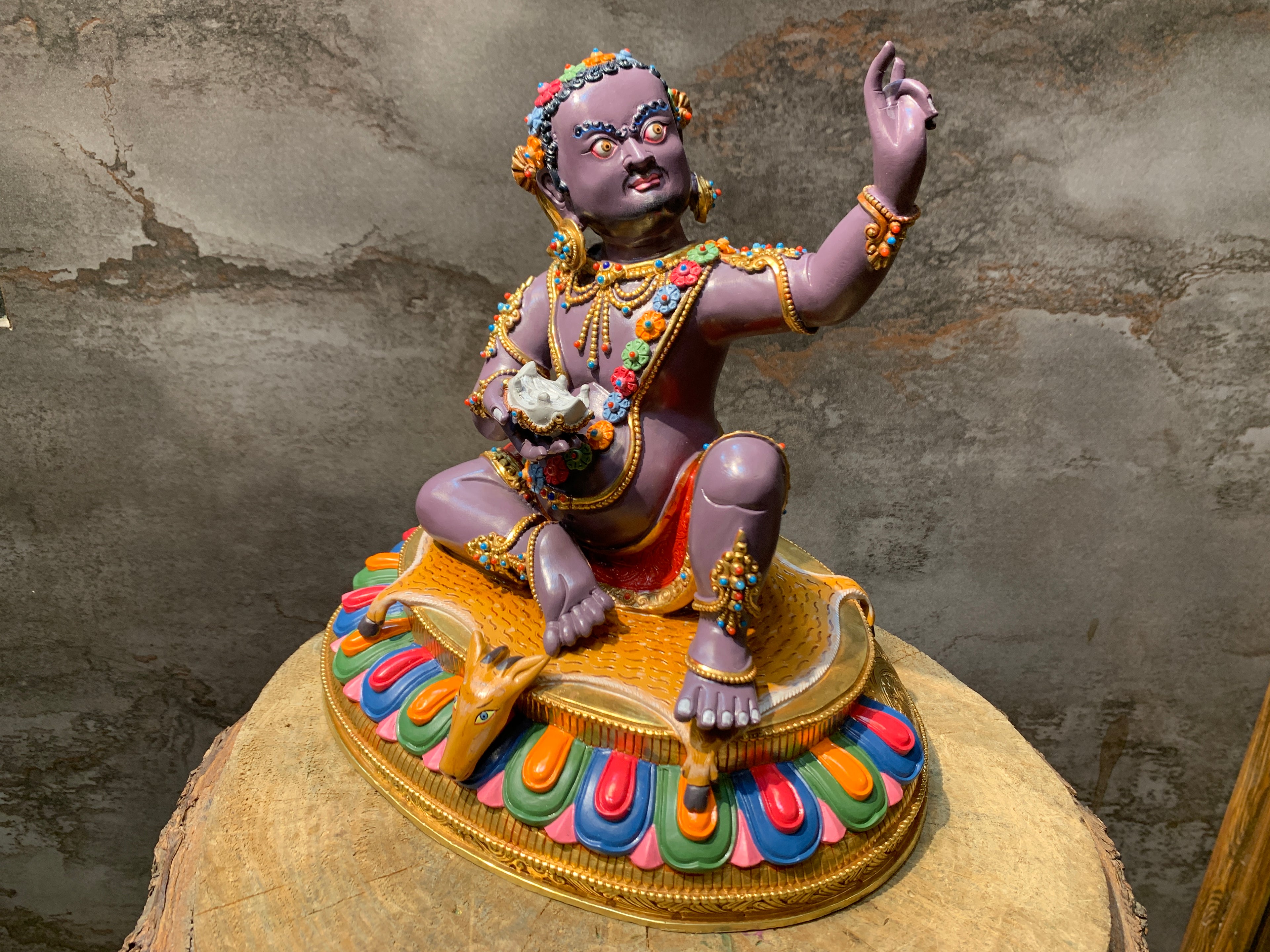 Colorful Virupa statue. hand crafted copper idol of mahasiddha Virupa.