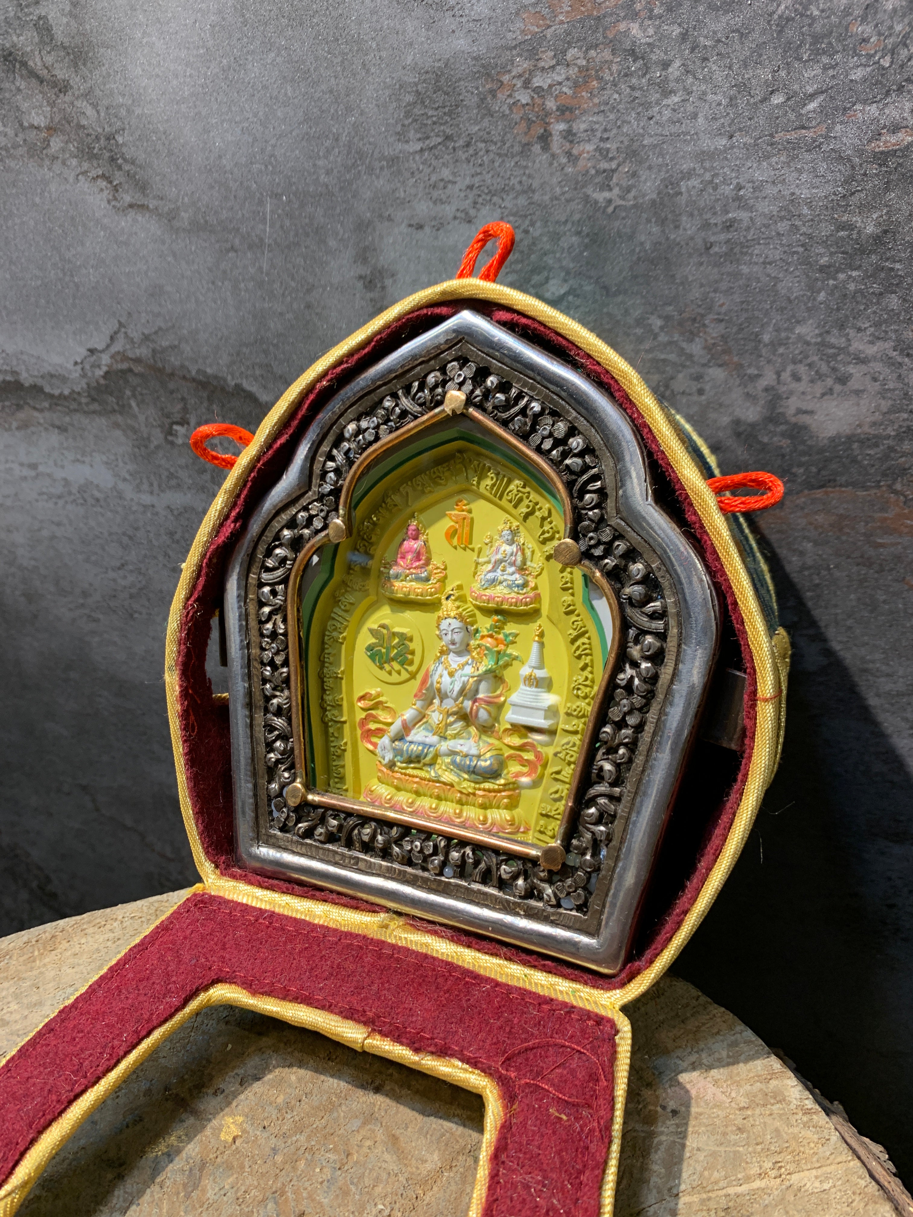 3 Longlife buddha tsatsa with ghau box. White tara, amitayus and namgyalma. Tselha namsum. Iron ghau box.