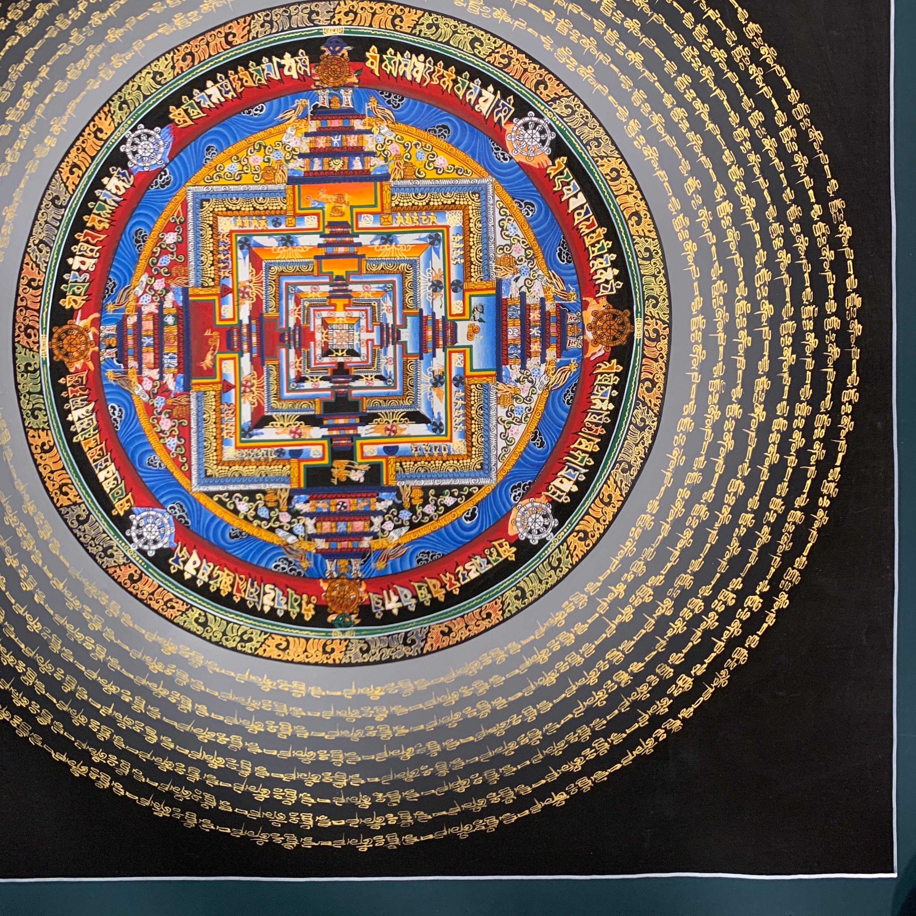 Kalachakra mandala thangka. hand painted wheel of time with mantra cycle.