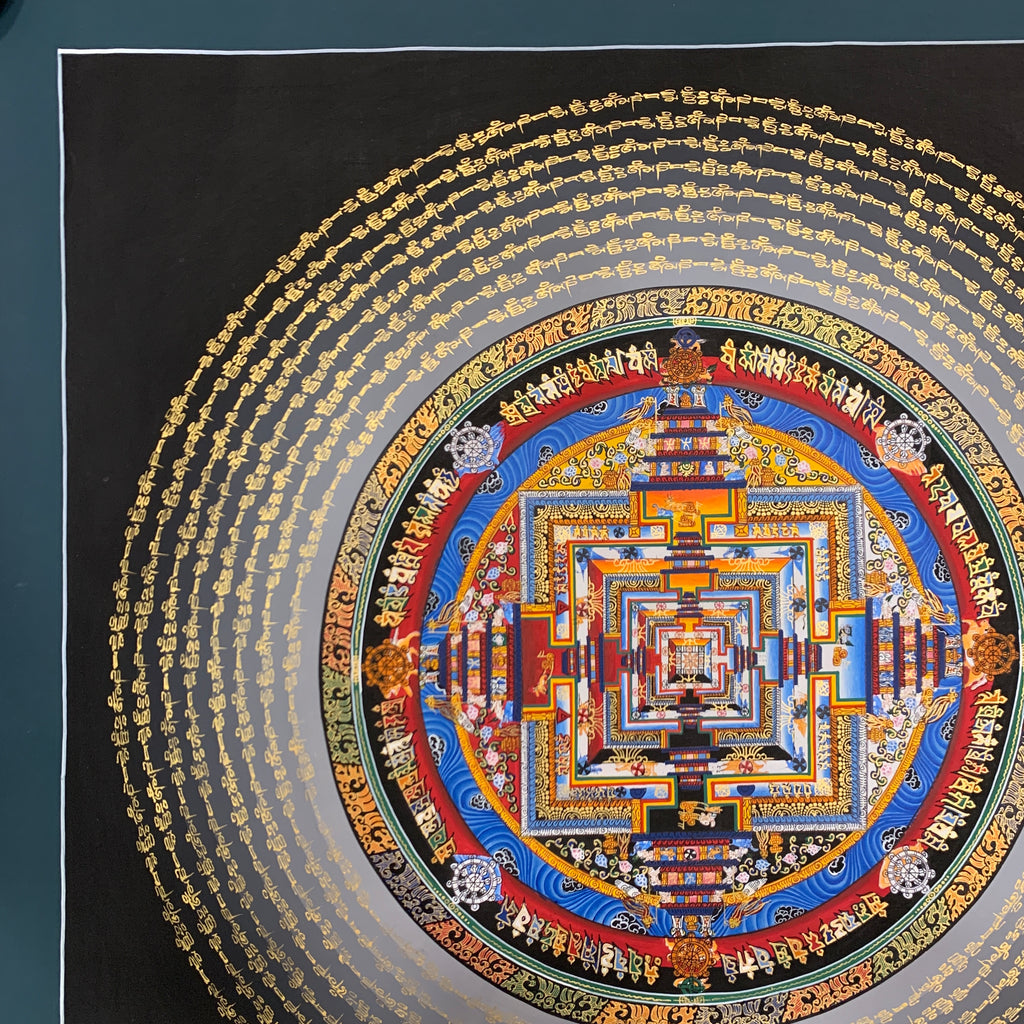 Kalachakra mandala thangka. hand painted wheel of time with mantra cycle.