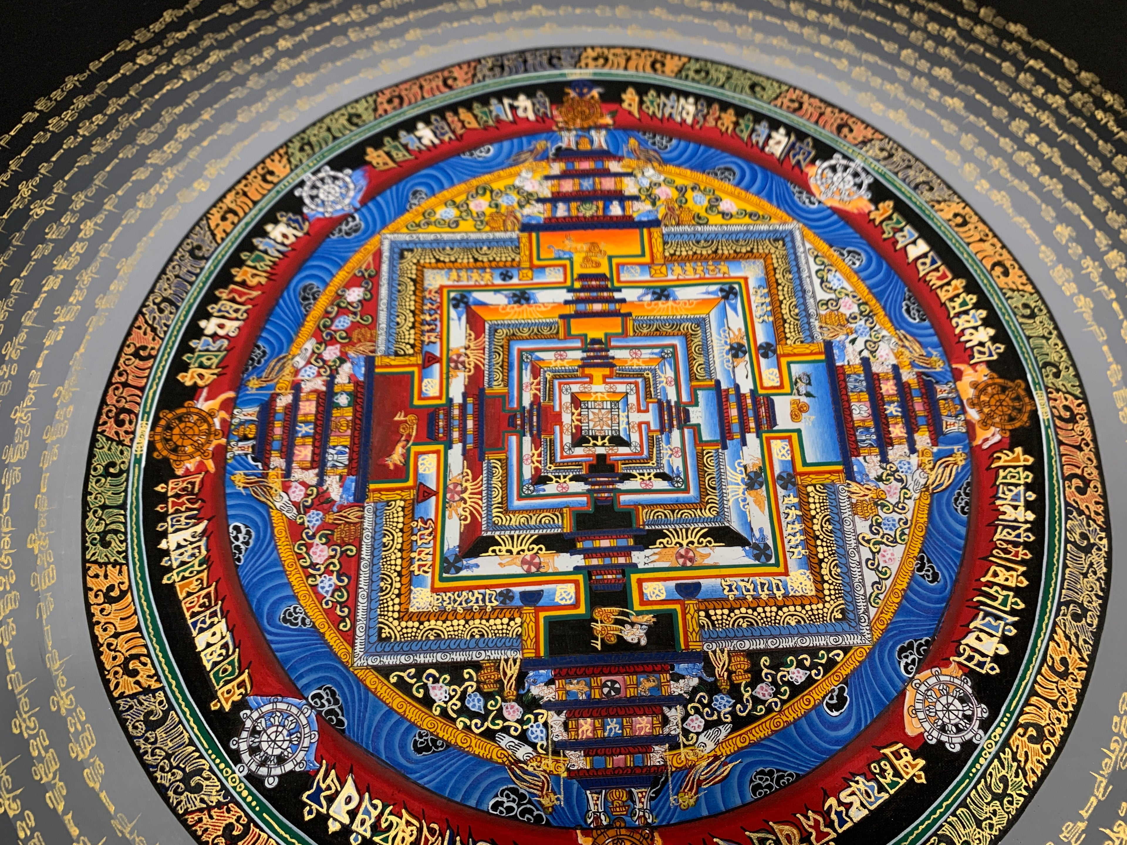 Kalachakra mandala thangka. hand painted wheel of time with mantra cycle.