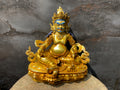 Handcrafted Gold gilt Yellow Dzambhala statue. copper statue of kuber. the god of wealth.