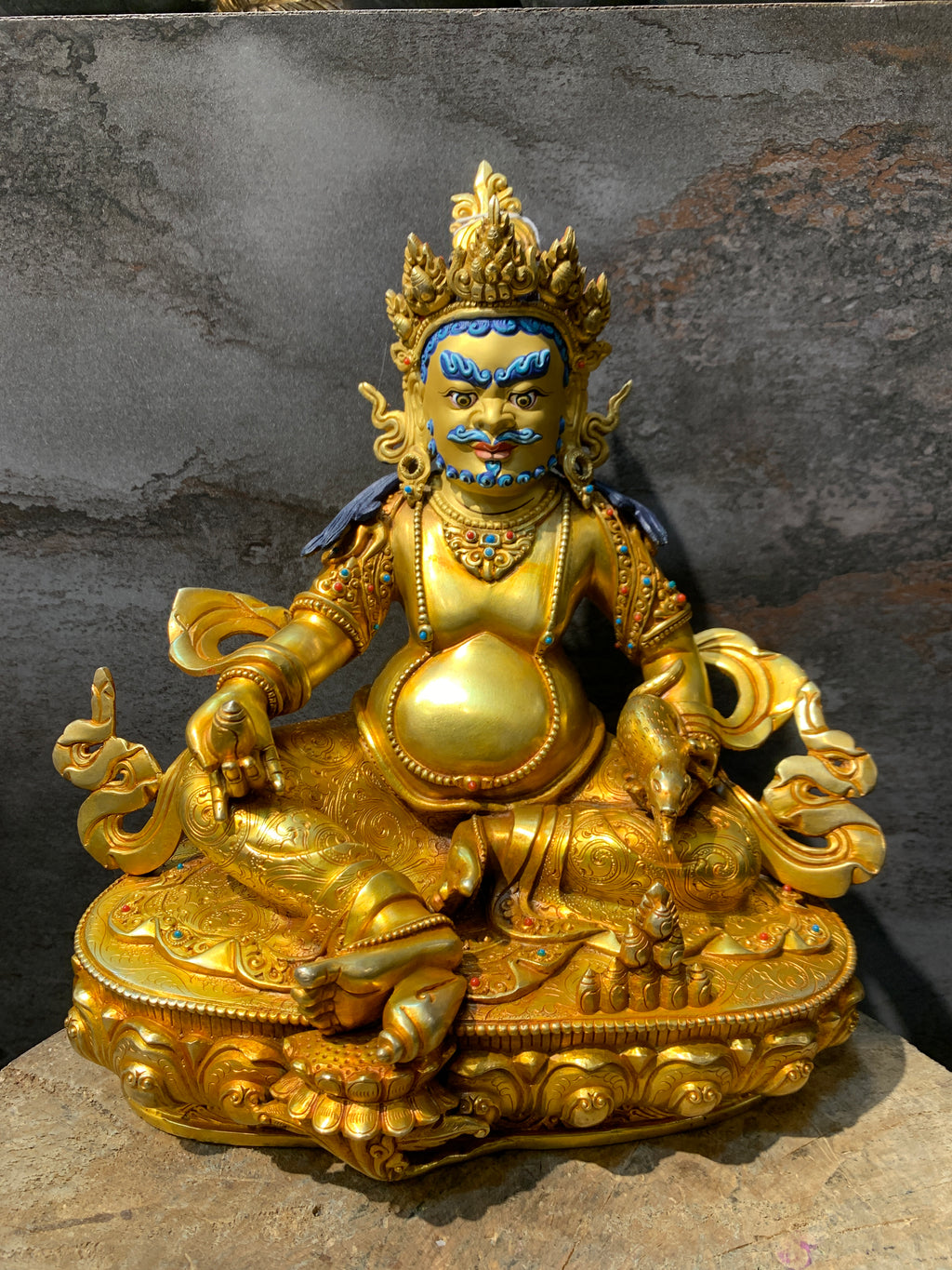 Handcrafted Gold gilt Yellow Dzambhala statue. copper statue of kuber. the god of wealth.