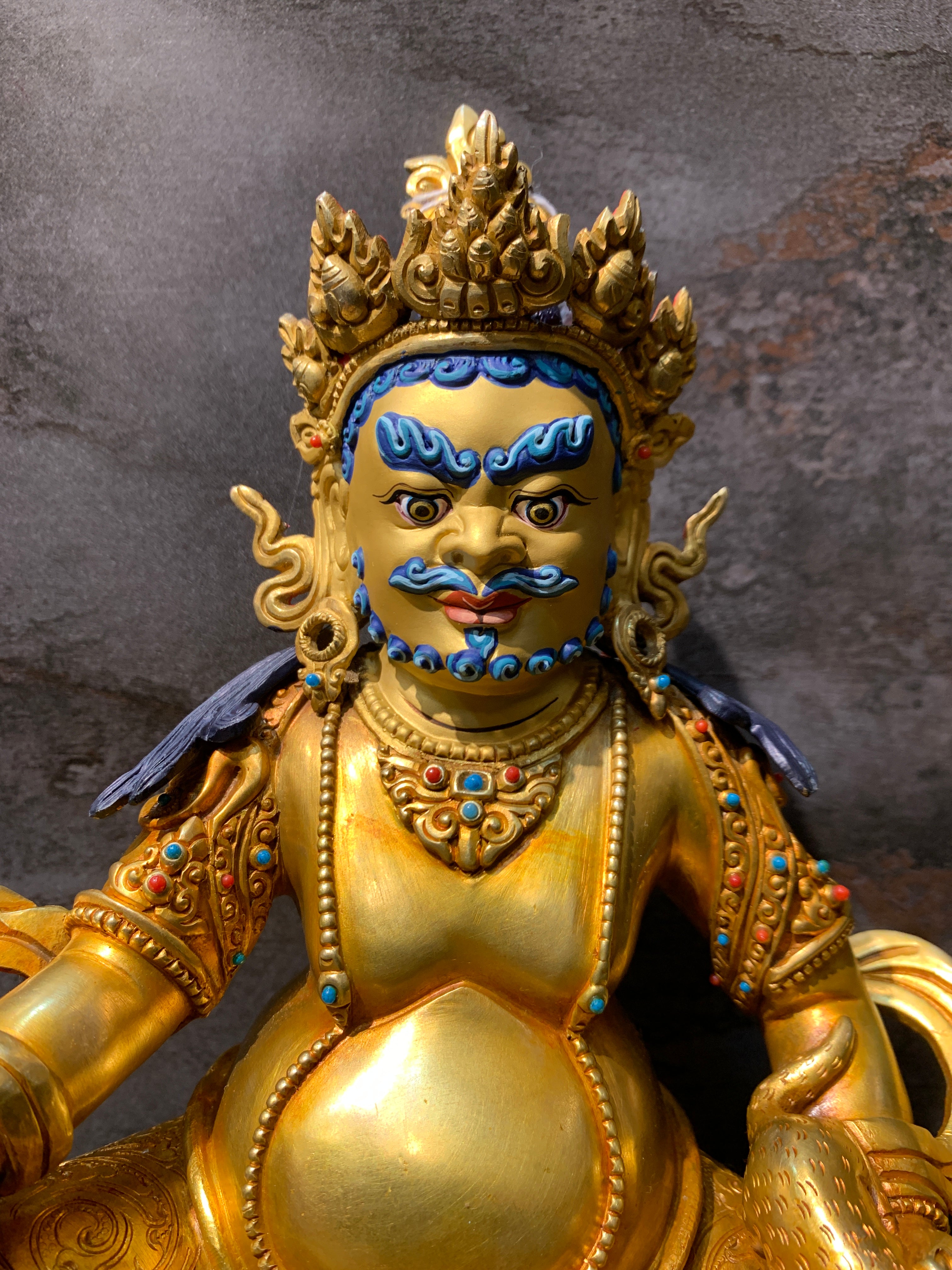 Handcrafted Gold gilt Yellow Dzambhala statue. copper statue of kuber. the god of wealth.