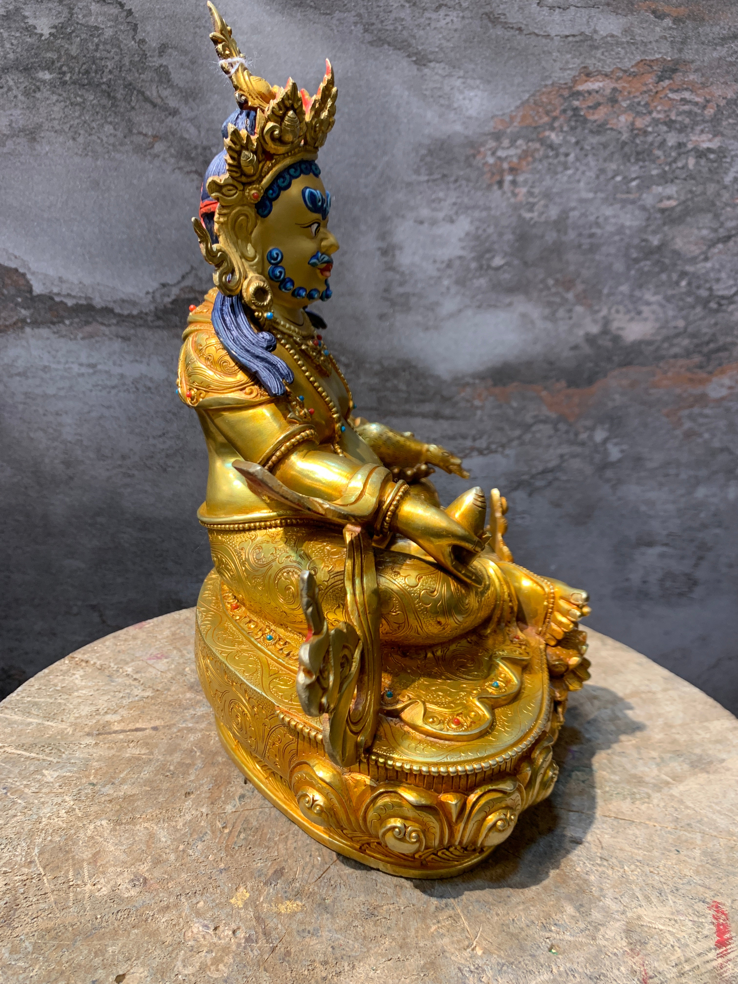 Handcrafted Gold gilt Yellow Dzambhala statue. copper statue of kuber. the god of wealth.