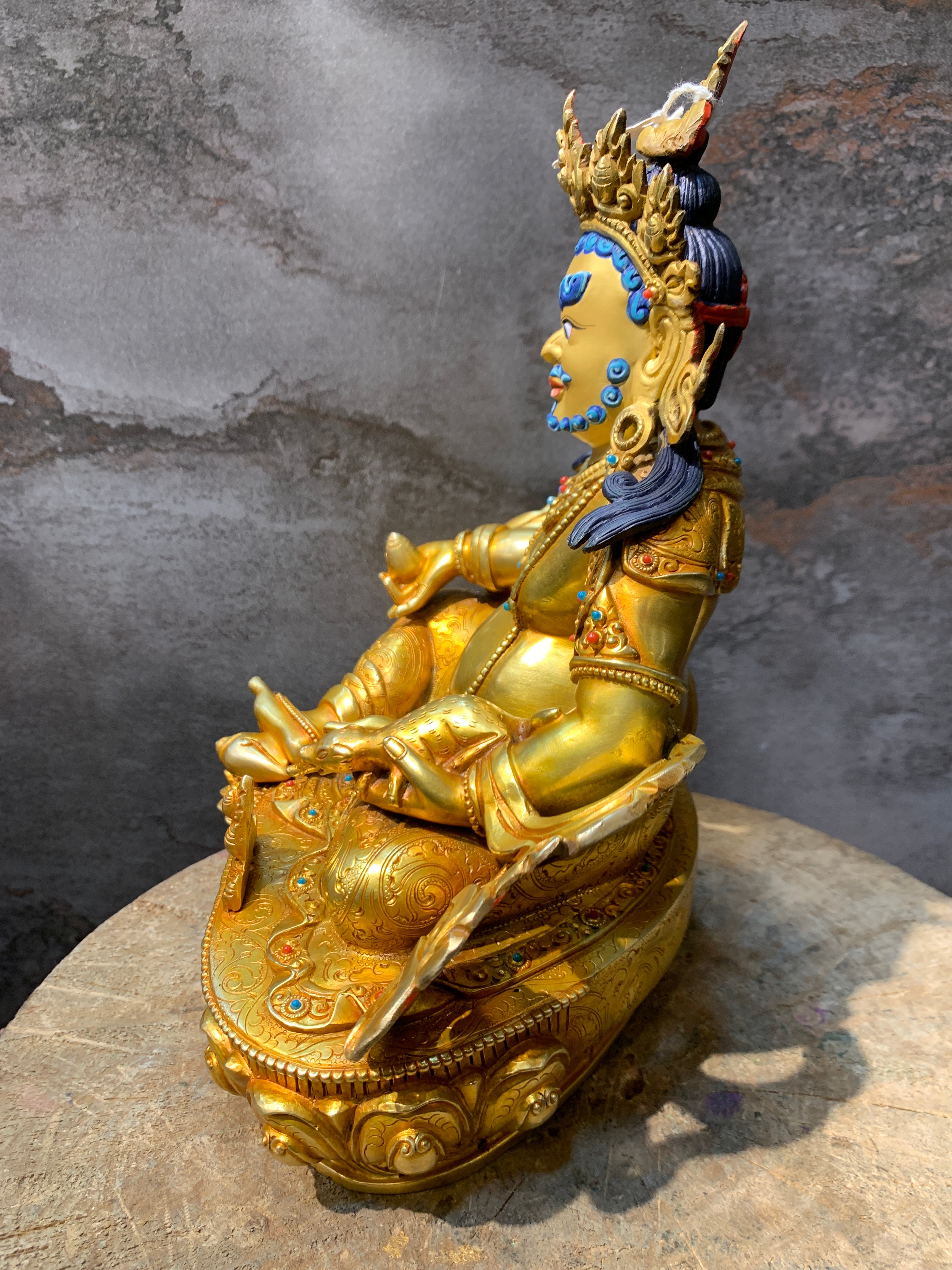 Handcrafted Gold gilt Yellow Dzambhala statue. copper statue of kuber. the god of wealth.